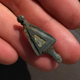 One of the 100-odd brooches found at the site.